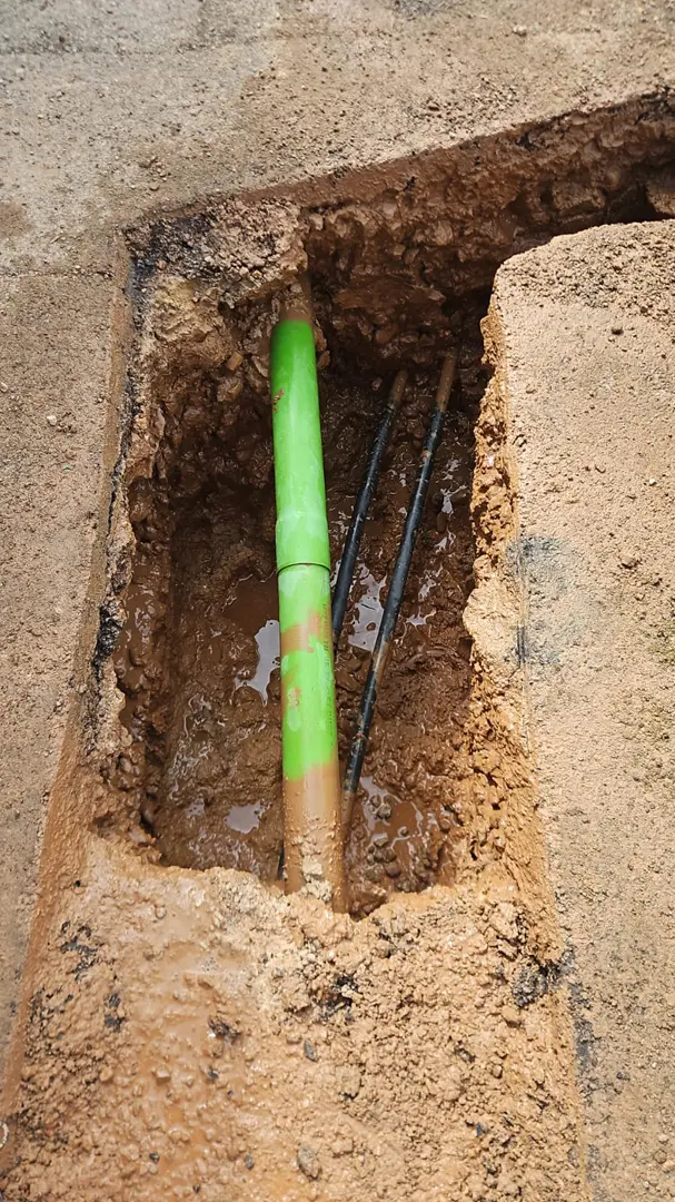 pipes and cables in a hydro-excavated trench